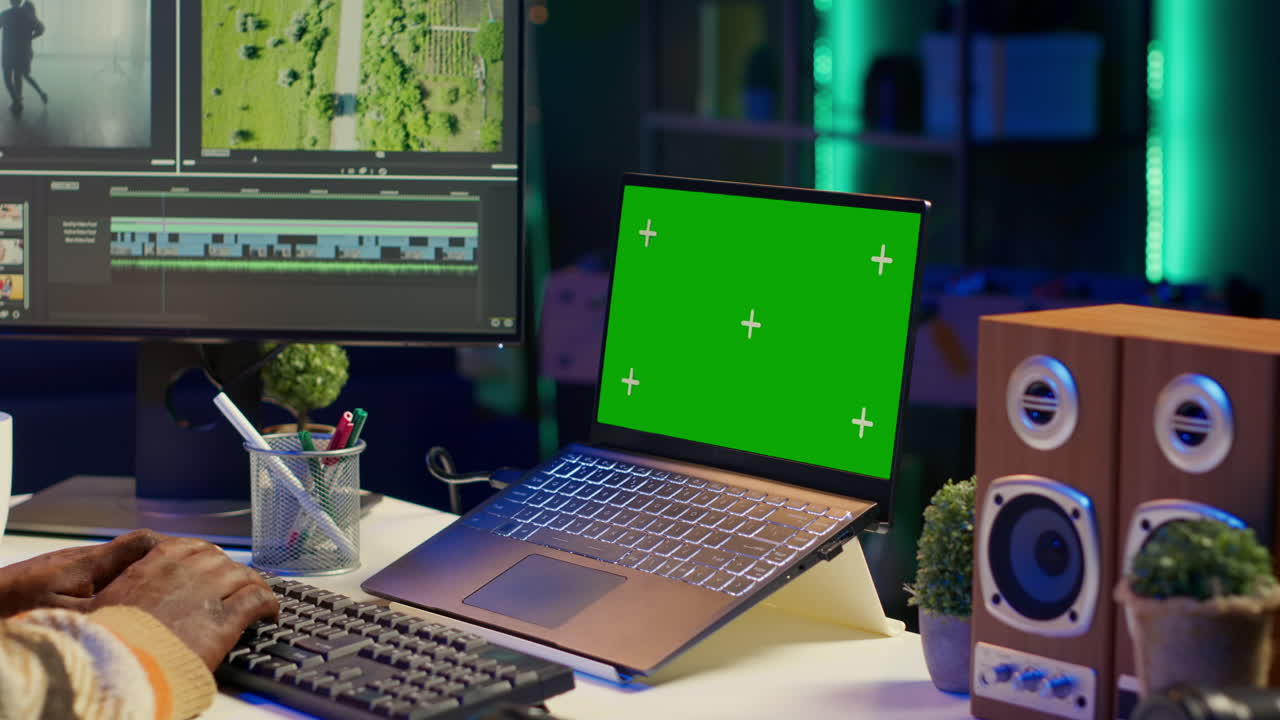 Laptop with Green Screen Used for Video Editing