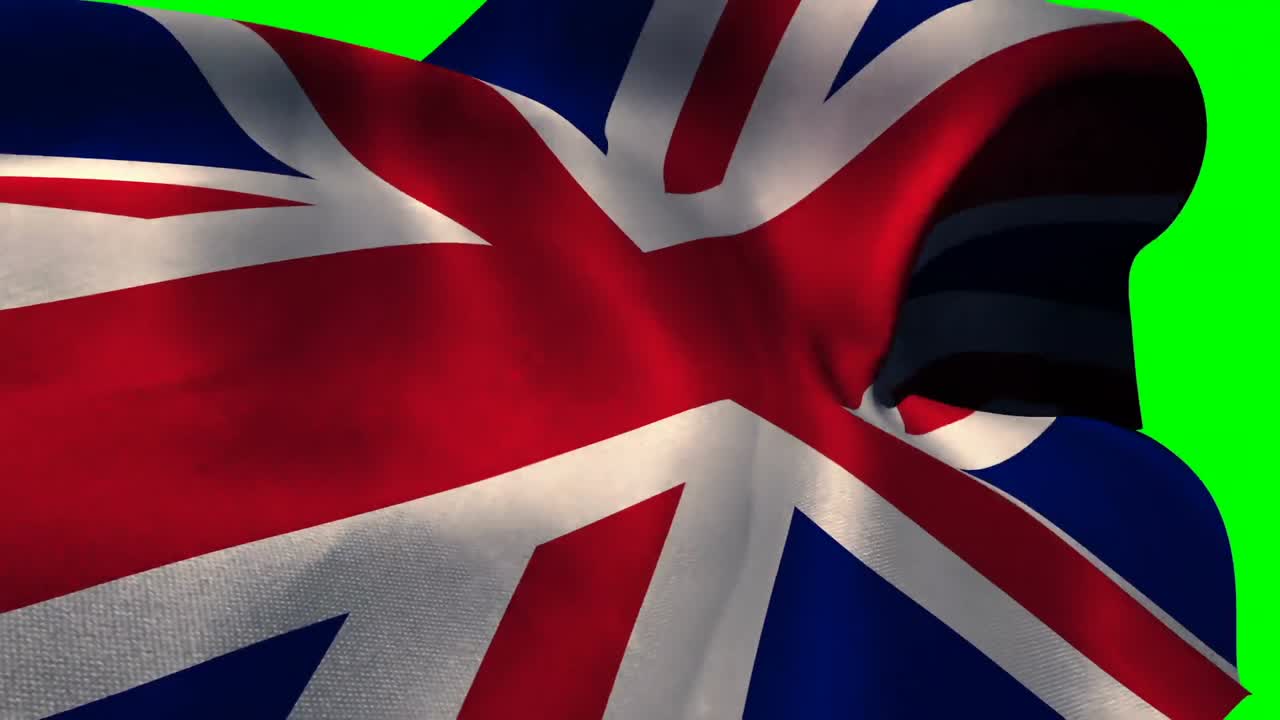 bandera de la unión ondeando contra la pantalla verde