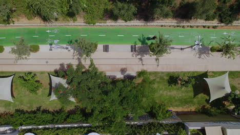 2-electric-scooters-crossing-the-frame-in-HaMesila-Park---Neve-Tzedek-tel-aviv-neighborhood---Top-down-view