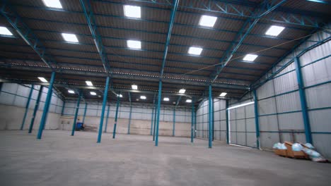 Wide-angle-view-of-empty-warehouse-or-factory