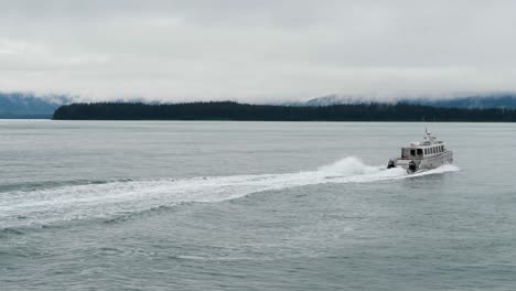 boat sailing on gastineau channel, juneau, alaska