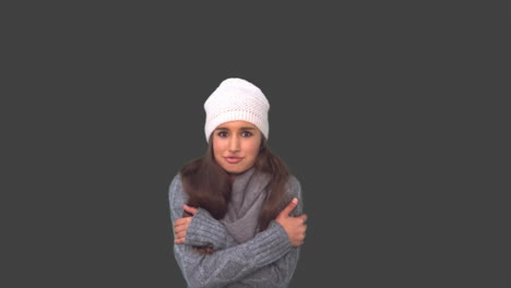 cold cute young woman shivering