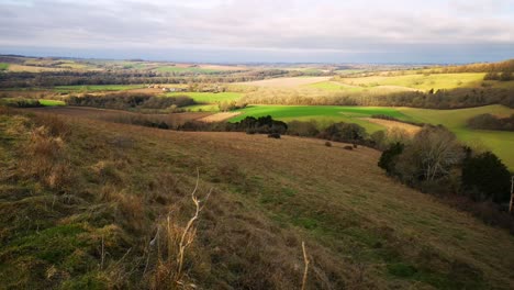 Beautiful-landscape-in-UK,-with-sun-blessing-the-hills-full-of-January-nuances,-creating-an-unreal-view