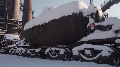 a snow-covered industrial area