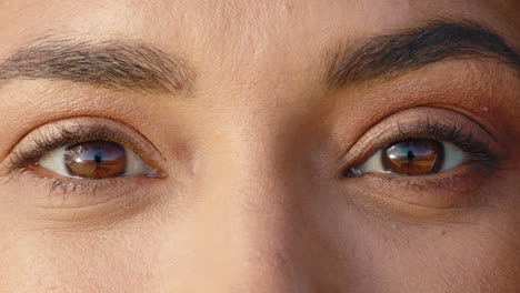 close-up-macro-eyes-of-beautiful-hispanic-woman-winking-playfully-healthy-eyesight-concept