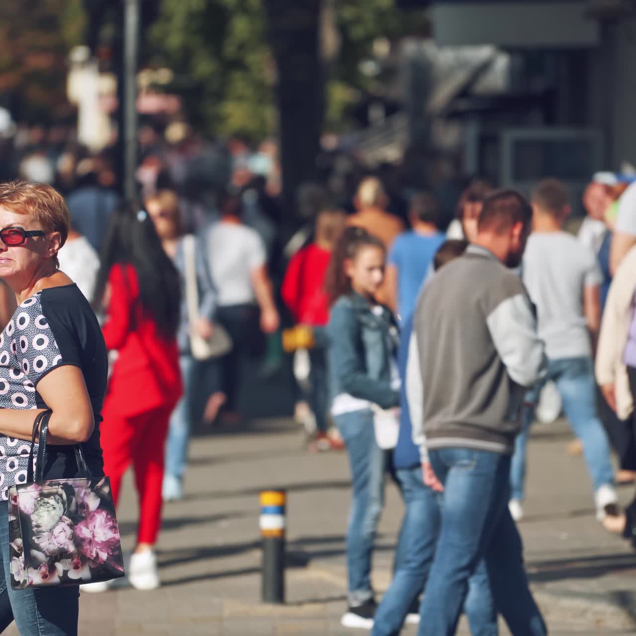 Crowd of people walking on streets
