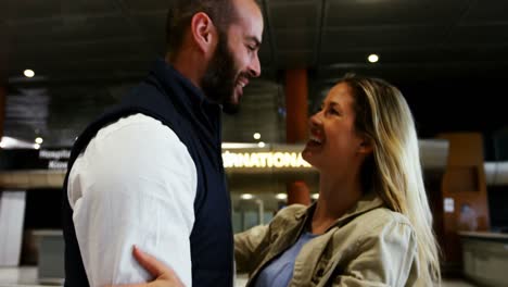 happy couple embracing each other