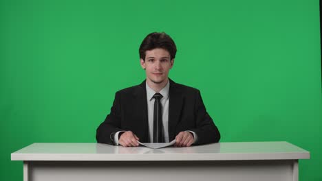 news anchor reading a script