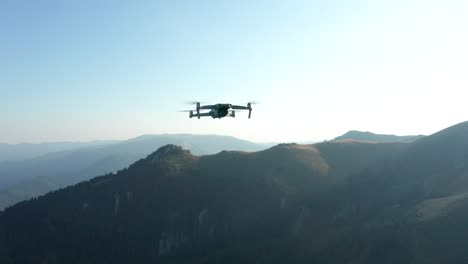 Closeup-in-air-of-a-drone-flying-over-the-mountains