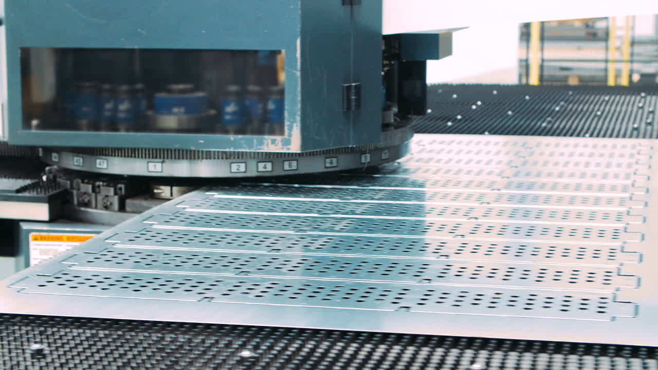 Industrial production of metallic half-finished products. Punching machine