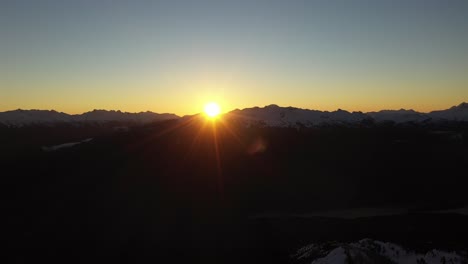 incredible sunrise over the mountains in whistler area, canada