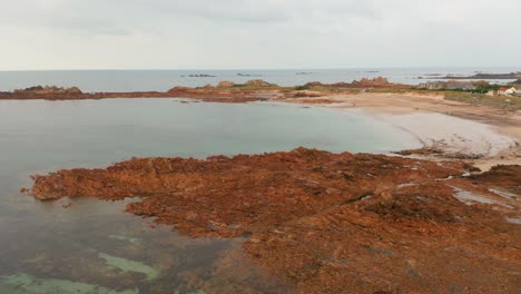 aerial view of a stunning rocky coastline and beach