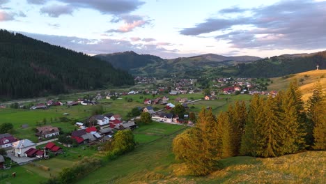 drone shot of stulpicani village showcasing its rural landscape and homes