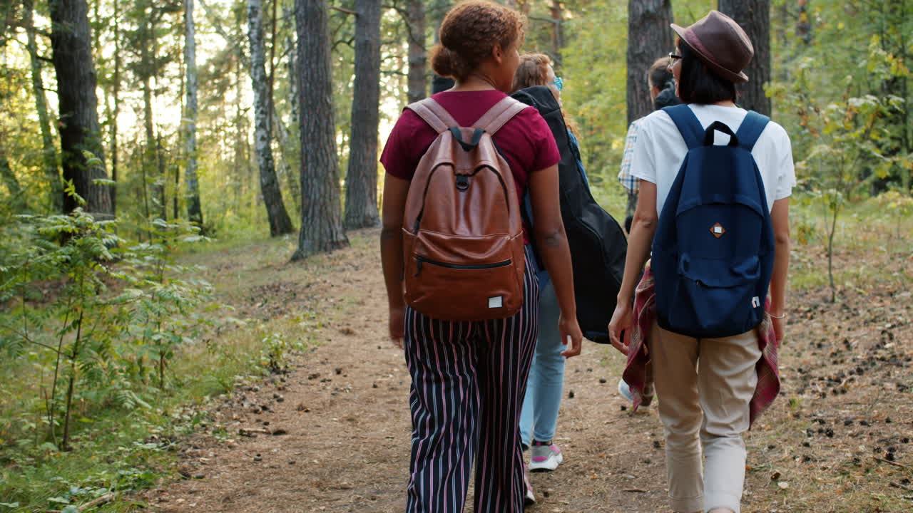 Friends Hiking Through the Woods