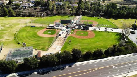 aerial panning shot of little league baseball fields angle 4