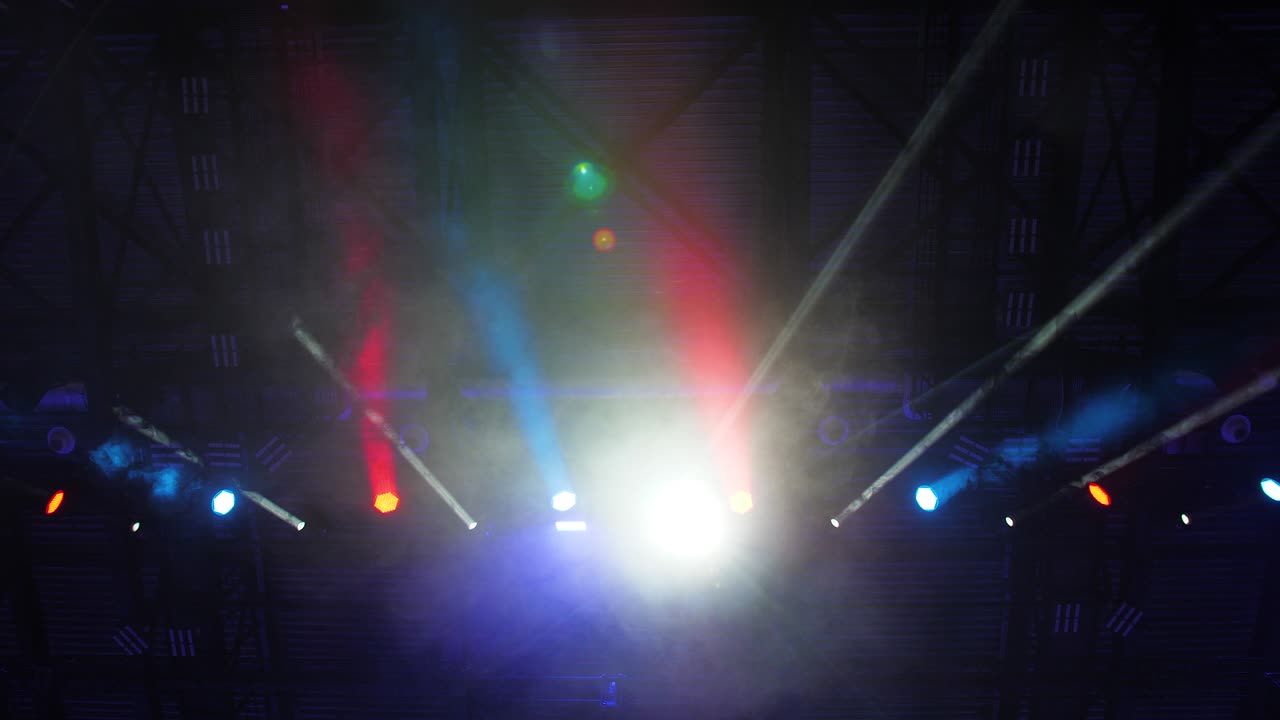 Multicolored spotlight of scene lights in the dark