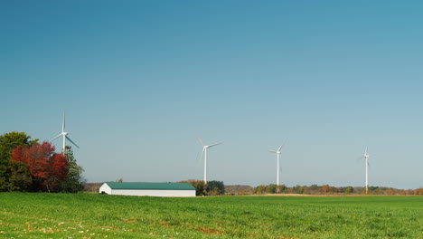 wind turbines and a barn