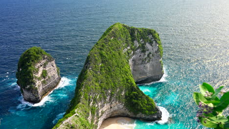 unique beach shaped cliff location. kelingking, dinosaur landmark