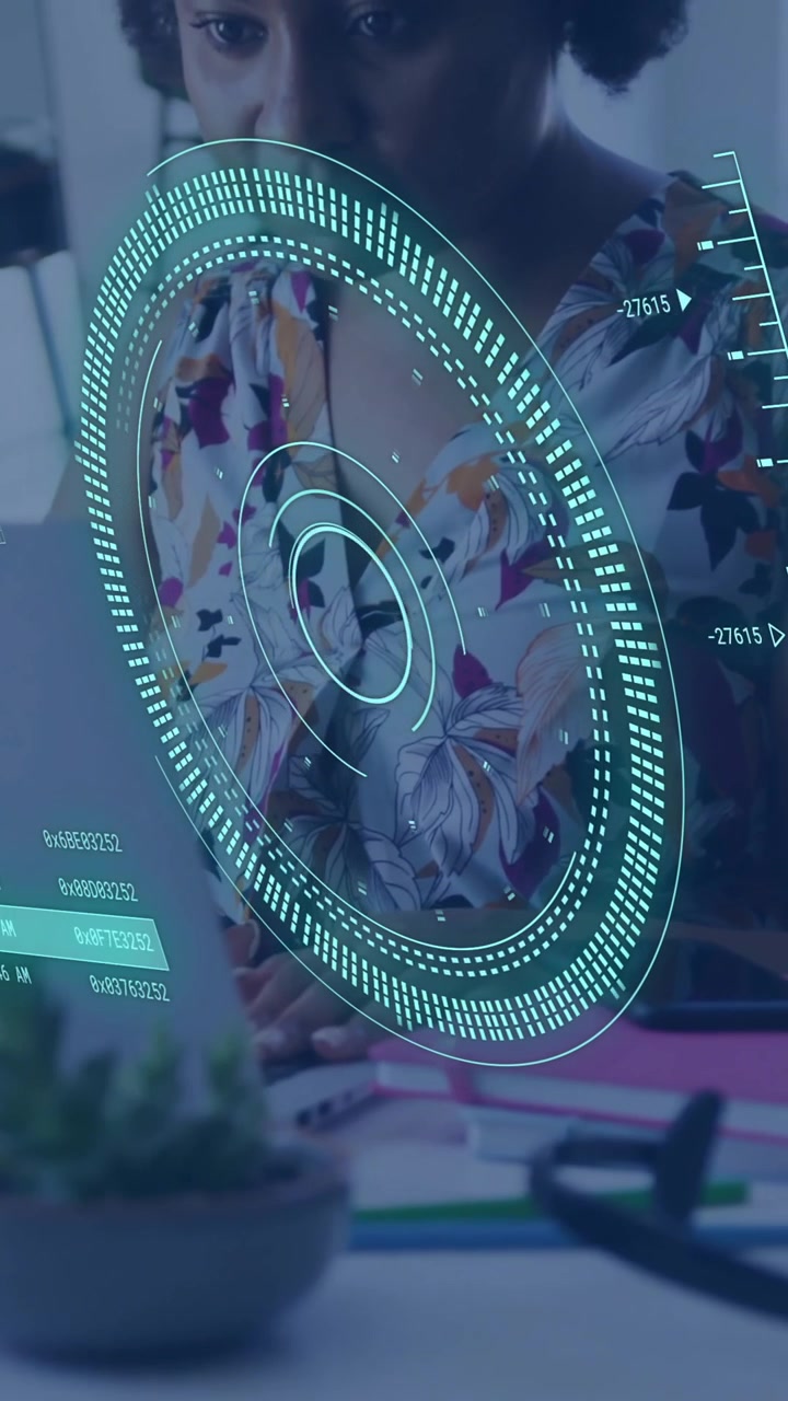 Animation of circular scanner and data over african american businesswoman using laptop at office