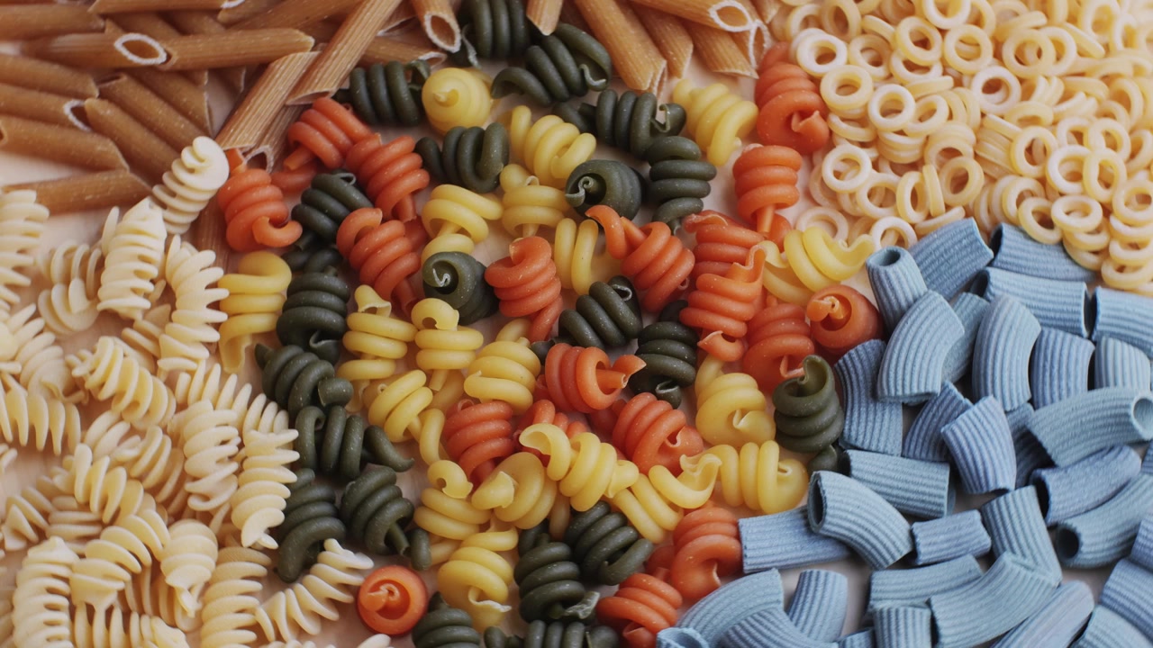 Close-Up of Various Colorful Dry Pasta Shapes