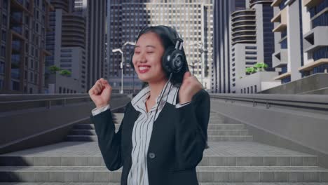 side view of an asian business woman listening to music with headphones and dancing in urban city