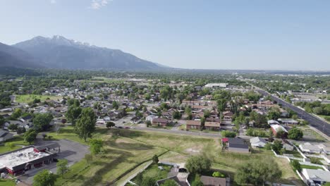 residential neighborhood real estate of ogden city, utah in summer - aerial drone view