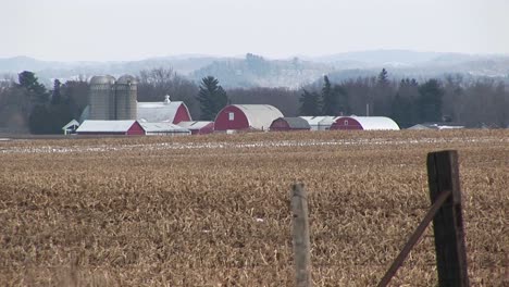 a farming landscape in winter after the crops have been harvested