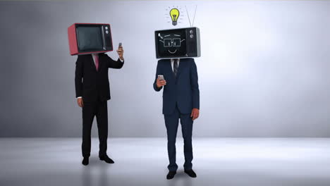 hombres de negocios con tv en la cabeza