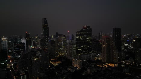 bangkok's modern and impressive skyline like never before, with stunning drone footage of the sathorn cbd at night