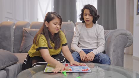 indian girl kid scraps the ludo game when brother is about to win