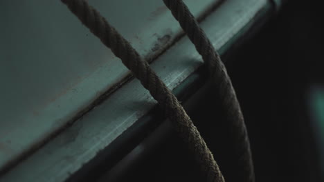 rope marine knot on a wooden boat close up
