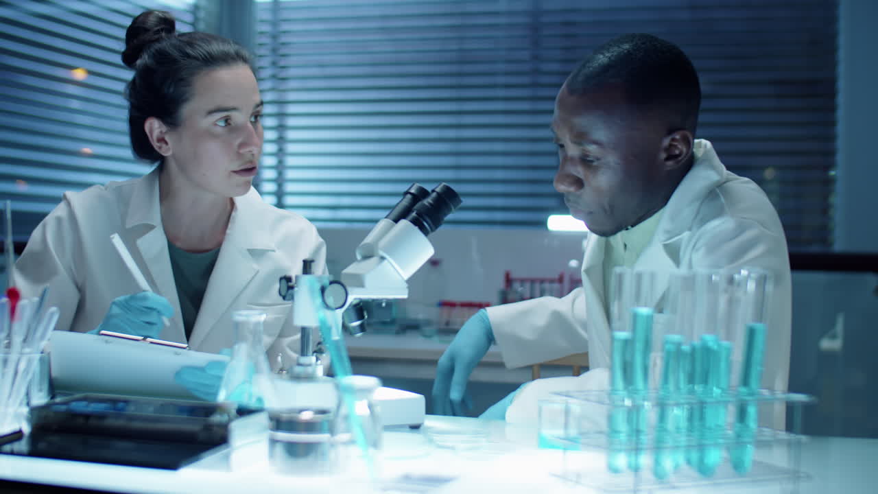 Diverse Scientists Cooperating in Laboratory