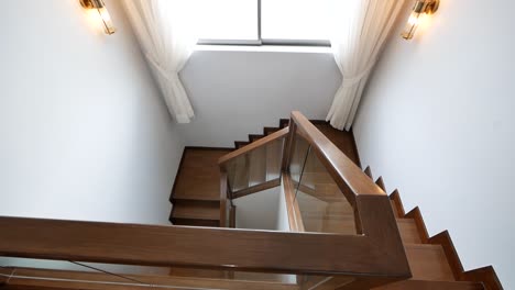 Nice-and-Clean-Shiny-Wooden-Stairway-and-White-Wall