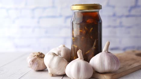 preserved garlic in a glass jar