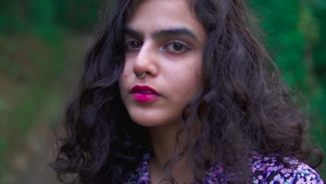 closeup focus shot of beautiful female staring wearing nose ring