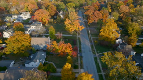 aerial flyover a street in a neighborhood of kirkwood, missouri in st