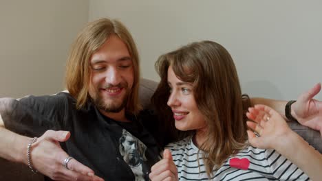 happy couple enjoying time together at home