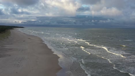 drone aerial view of baltic sea waves. palanga, lithuania. windy day