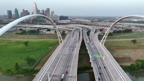 aerial entering dallas texas over margaret mcdermott bridge, interstate 30