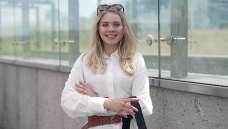 smiling woman in city outfit