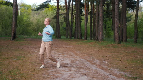 woman enjoying a walk in a spring forest