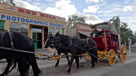 horse-drawn carriage passing by old buildings