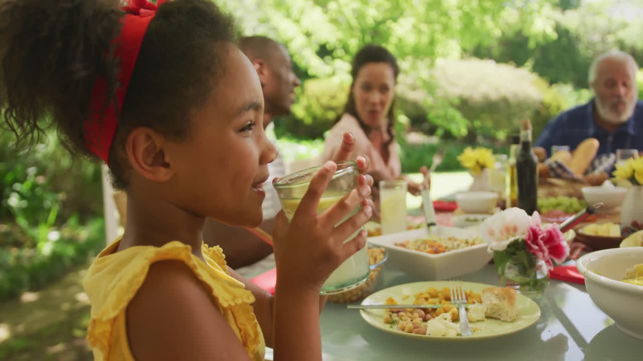 African American girl spending time in garden,