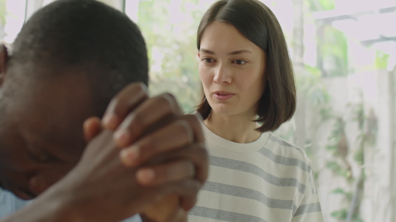 Wife Comforting Sad Husband after Dismissal