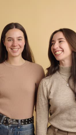 two friends laughing together in a joyful moment