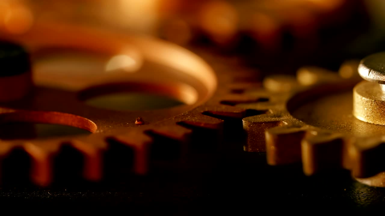 mechanism wheels spinning together- close up