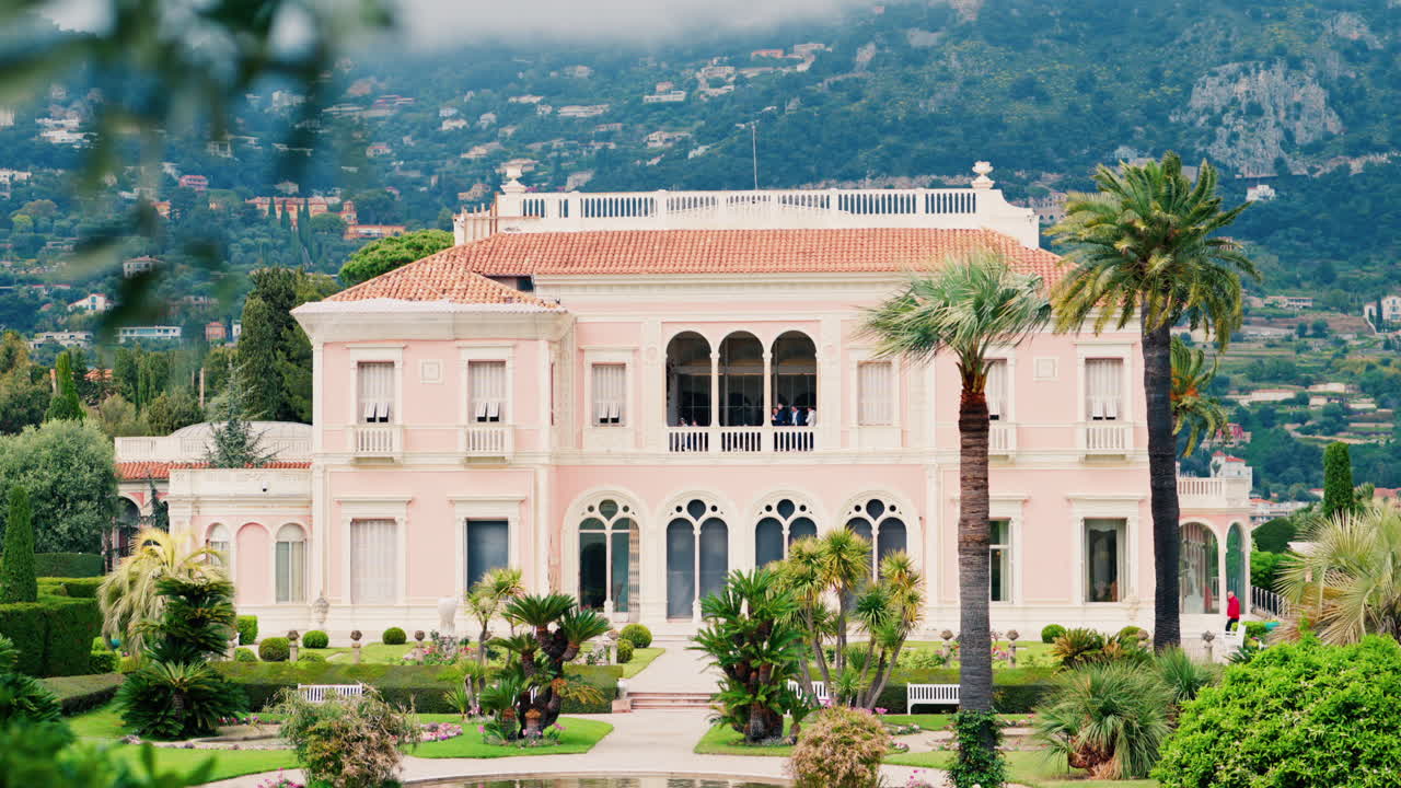 Saint-Jean-Cap-Ferrat, France - April 17, 2025: View of the Villa Ephrussi de Rothschild Museum surrounded by greenery