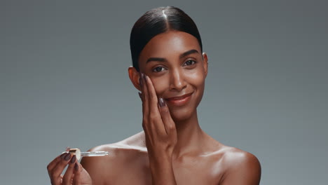 woman, serum and drop on face