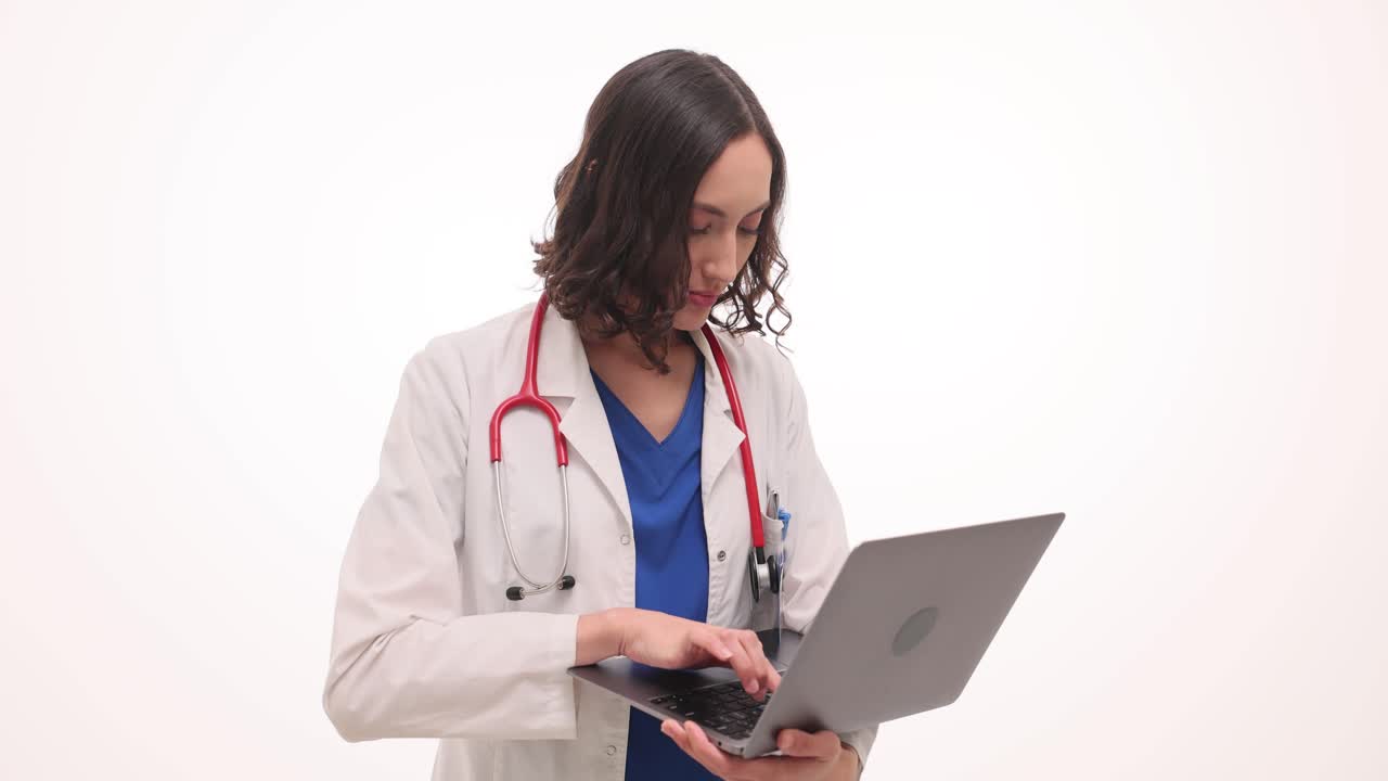 Female doctor using a laptop
