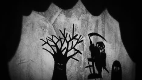 spooky shadow puppets of a halloween scene